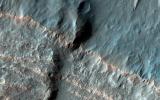 This image acquired on January 17, 2024 by NASA's Mars Reconnaissance Orbiter shows many craters in the mid-latitudes of Mars are partially filled with deposits that have been interpreted to be ice-rich.