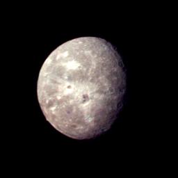 This image of Oberon, Uranus' outermost moon, was captured by NASA's Voyager 2 on Jan. 24, 1986. Clearly visible are several large impact craters in Oberon's icy surface surrounded by bright rays.