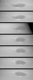 These images taken by NASA's Voyager 2 show changes in the clouds around Neptune's Great Dark Spot (GDS) over a four and one-half-day period. From top to bottom the images show successive rotations of the planet an interval of about 18 hours.