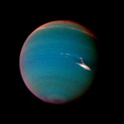 In this false color image of Neptune, objects that are deep in the atmosphere are blue, while those at higher altitudes are white. The image was taken by Voyager 2's wide-angle camera through an orange filter and two different methane filters.
