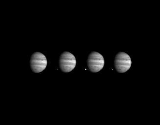 These four images of Jupiter and the luminous night-side impact of fragment W of Comet Shoemaker-Levy 9 were taken NASA's Galileo spacecraft on July 22, 1994.