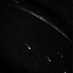 This NASA Voyager 1 image was taken of Jupiter's darkside on March 5, 1979 when the spacecraft was in Jupiter's shadow, about 6 hours after closest approach to the planet at a distance of 320,000 miles.