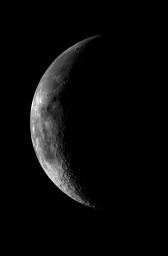 This image of the crescent moon was obtained by the Galileo Solid State imaging system on December 8, 1995 at 5 a.m. PST as NASA's Galileo spacecraft neared the Earth.