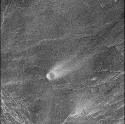 This comet-like tail, trending northeast from the volcanic structure, is a relatively radar-bright deposit. The volcano, with a base diameter of about 3 miles, is a local topographic high point that has slowed down northeast trending winds.