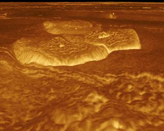 A portion of the eastern edge of Alpha Regio is displayed in this three-dimensional perspective view of the surface of Venus from NASA's Magellan spacecraft.