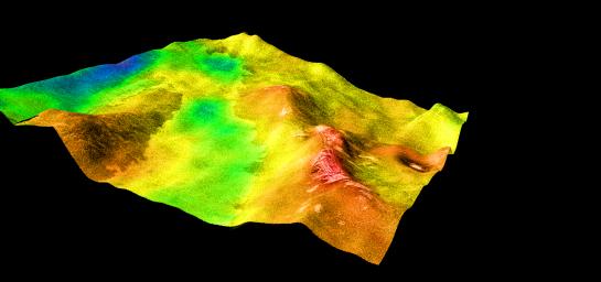This perspective view of Venus, generated by computer from NASA's Magellan data and color-coded with emissivity, shows part of Sedna Planitia and illustrates a common phenomenon of the lowland plains of Venus.