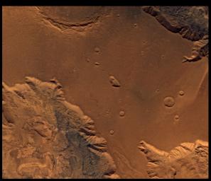 This image from NASA's Viking Orbiter 2 of West Candor Chasm shows parts of central Valles Marineris, including Candor Chasm (lower left), Ophir Chasm (lower right), and Hebes Chasm (upper right).