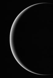 This image shows a crescent Uranus, a view that Earthlings never witnessed until Voyager 2 flew near and then beyond Uranus on Jan 24, 1986.
