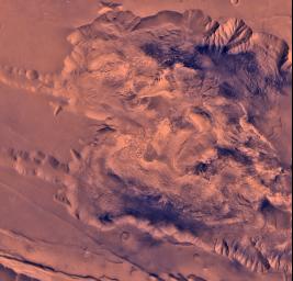 During its examination of Mars, NASA's Viking 1 spacecraft returned images of Valles Marineris, a huge canyon system 5,000 km long, up to 240 km wide, and 6.5 km deep. This view shows west Candor Chasm.