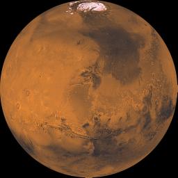 The north polar cap is visible in this projection at the top of the image from NASA's Viking Orbiter 1, the great equatorial canyon system (Valles Marineris) below center, and four huge Tharsis volcanoes (and several smaller ones) at left.