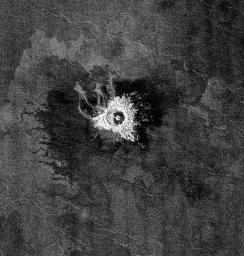 This full-resolution image from NASA's Magellan spacecraft shows an impact crater named Jeanne. The distinctive triangular shape of the ejecta indicates that the impacting body probably hit obliquely, traveling from southwest to northeast. 