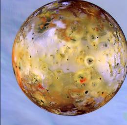 Io, the most volcanic body in the solar system, is seen in front of Jupiter's cloudy atmosphere in this image taken Sept. 7, 1996, by NASA's Galileo spacecraft, now orbiting the giant planet.