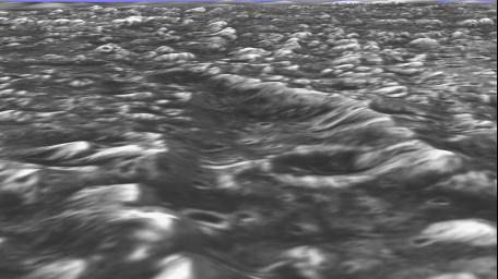 Topographic detail is seen in this stereoscopic view of the Galileo Regio region of Jupiter's moon Ganymede. The picture is a computer reconstruction from two images taken by NASA's Galileo during 1996.