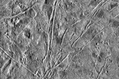 The icy surface of Europa, one of the moons of Jupiter, was photographed by NASA's Galileo spacecraft on its fourth orbit around Jupiter.