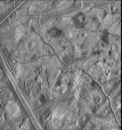 This view of the surface of one of Jupiter's moons, Europa, taken by NASA's Galileo spacecraft on Feb. 20, 1997, shows the complex icy crust that has been extensively modified by fracturing and the formation of ridges.