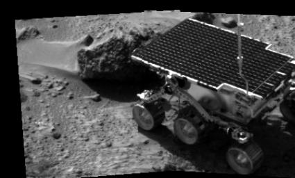NASA's Sojourner's first analysis of a rock on Mars began on Sol 3 with the study of Barnacle Bill, a nearby rock named for its rough surface. The image was taken by the Imager for Mars Pathfinder (IMP) after its deployment on Sol 3.