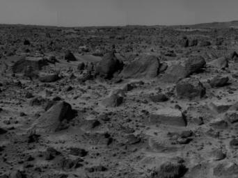'Flat Top,' the rectangular rock at lower right, is part of a stretch of rocky terrain in this image, taken by NASA's deployed Imager for Mars Pathfinder (IMP) on July 7, 1997. 