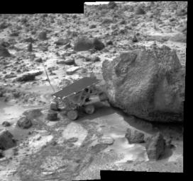 Sojourner made contact with the rock 'Yogi' in this image, along with the lander's deflated airbags, were imaged by NASA's Imager for Mars Pathfinder (IMP) on July 10, 1997.The rover's left rear wheel has driven up onto the Yogi's surface.
