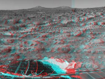 The two hills in the distance in this stereo image from NASA's Mars Pathfinder have been dubbed the 'Twin Peaks.' 3D glasses are necessary to identify surface detail.


