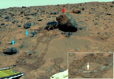 This scene, taken by NASA's Mars Pathfinder in 1997, shows the rover deployed at rock 'Yogi,' the colors have similarly been enhanced to bring out differences. The same three kinds of rocks are recognized as in the distance.
