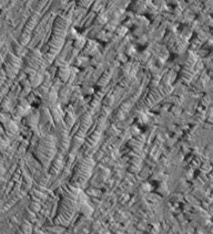 Dunes in etch pits and troughs in Crommelin Crater in the Oxia Palus area. This 3.2 x 3.5 km image (frame 3001) is centered near 4.1 degrees north, 5.3 degrees west, taken by NASA's Mars Global Surveyor Orbiter.