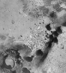 Rare tear-shaped dark dunes in this 6.4 x 7.0 km image (frame 10004) centered near 47 degrees south, 341 degrees west, taken by NASA's Mars Global Surveyor Orbiter.
