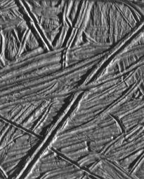 This high resolution image of the icy plains on Europa shows multiple sets of cross-cutting ridges. Many of these ridges 

are cut by younger fractures. NASA's Galileo spacecraft obtained this image on February 20, 1997.