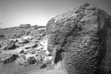 This view of the rock 'Chimp' was acquired by NASA's Sojourner rover's right front camera on Sol 74. A large crack, oriented from lower left to upper right, is visible in the rock. Sol 1 began on July 4, 1997.