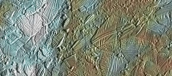 View of a small region of the thin, disrupted, ice crust in the Conamara region of Jupiter's moon Europa showing the interplay of surface color with ice structures. Image captured by the Solid State Imaging (CCD) system on NASA's Galileo spacecraft.