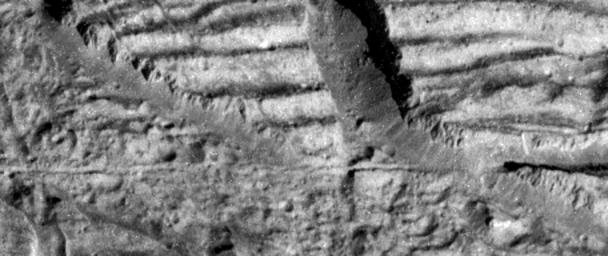 This image, taken by the camera onboard NASA's Galileo spacecraft, is a very high resolution view of the Conamara Chaos region on Jupiter's moon Europa. It shows an area where icy plates have been broken apart and moved around laterally.