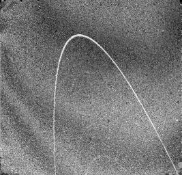 NASA's Voyager 2 captured this view of the outer part of the Uranian ring system the morning of Jan. 24, 1986, just 11 minutes before passing through the ring plane.
