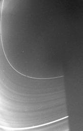 NASA's Voyager 2 took this picture of Saturn's faint inner D-ring Aug. 25, 1981, about 1 hour 48 minutes before the spacecraft's closest approach to Saturn. The range was 195,400 kilometers (121,300 miles)
.