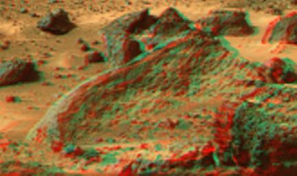 This anaglyph view of 'Ender,' due south of the lander, was produced by NASA's Mars Pathfinder's Imager camera. 3D glasses are necessary to identify surface detail.