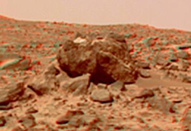 This anaglyph view of 'Half Dome,' 25 meters to the west of the Soujourner, was produced by NASA's Mars Pathfinder's Imager camera. 3D glasses are necessary to identify surface detail.