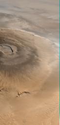 This image taken on April 25, 1998 by NASA's Mars Global Surveyor shows Olympus Mons, a mountain on Mars. About as wide as the entire Hawaiian Island chain, this giant volcano is nearly as flat as a pancake.