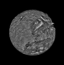 Uranus' moon Miranda is shown in a computer-assembled mosaic of images obtained Jan. 24, 1986, by NASA's Voyager 2 spacecraft. Miranda is the innermost and smallest of the five major Uranian satellites,