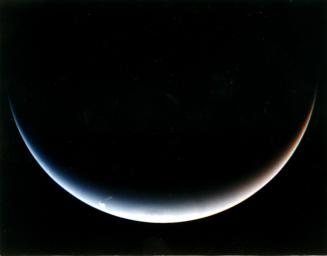NASA's Voyager 2's post-encounter view of Neptune's south pole as the spacecraft sped away on a southward trajectory.
