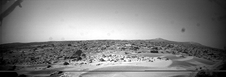 This image was taken by NASA's Sojourner rover in the area behind the 'Rock Garden' at the Pathfinder landing site and gives a view of the Martian surface not seen from the lander. Sol 1 began on July 4, 1997.