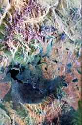 This false-color composite radar image of the Mammoth Mountain area in the Sierra Nevada Mountains, California, was acquired by NASA's Spaceborne Imaging Radar-C and X-band Synthetic Aperture Radar aboard the space shuttle Endeavour.