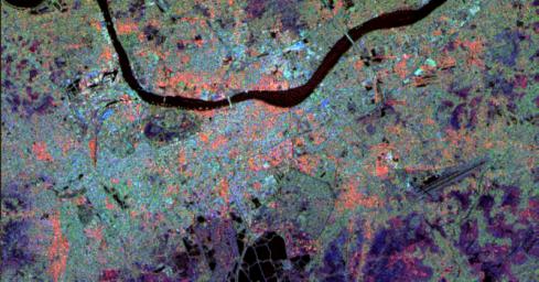 This radar image from NASA's Spaceborne Imaging Radar-C/X-band Synthetic Aperture of Calcutta, India, illustrates different urban land use patterns; it is the largest city in India, located on the banks of the Hugli River, shown as the thick, dark line.