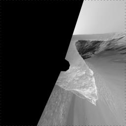 NASA's Mars Exploration Rover Opportunity used its navigation camera to take the images combined into this stereo view of the rover's surroundings on the 958th sol, or Martian day, of its surface mission (Oct. 4, 2006)
