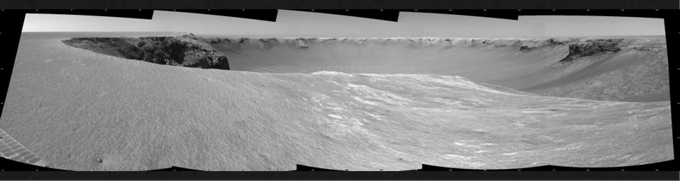 NASA's Mars Exploration Rover Opportunity used its navigation camera to take the images combined into this stereo view of the rover's surroundings on the 958th sol, or Martian day, of its surface mission (Oct. 4, 2006)