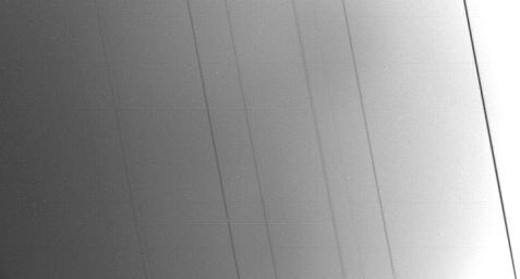 This silhouetted image of the rings of Uranus was taken by NASA's Voyager 2 spacecraft on Jan. 24, 1986, just 27 minutes before its closest approach to the planet.