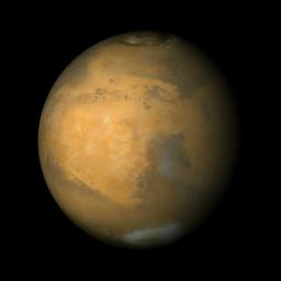 NASA's Mars Global Surveyor shows a large, circular bright region called Arabia Terra. Syrtis Major is the dark region toward the lower right. The north polar cap is visible at the top, and the bright feature lower right is the Hellas Basin.