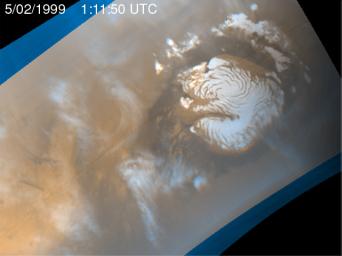 NASA's Mars Global Surveyor shows mid-summer in the northern hemisphere of Mars, a time of enhanced heating that leads to the release of water vapor into the atmosphere.