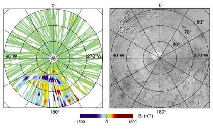 NASA's Mars Global Surveyor shows a radial magnetic field measured over the South Polar Region with corresponding image showing the polar cap. Strips are in the Terra Sirenum region.