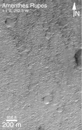 NASA's Mars Global Surveyor shows an area on Mars that appears to be smooth, with rough texture probably cause by wind erosion.