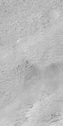 NASA's Mars Global Surveyor shows a snow-covered surface located on Malea Planum, south of the giant Hellas impact basin on Mars.