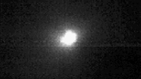 This image from an animation shows comet Tempel 1 as seen through the clear filter of the medium resolution imager camera on NASA's Deep Impact.