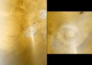 This pair of images color images from NASA's Mars Global Surveyor shows early autumn clouds over the Arsia Mons volcano, plus the shadow of the innermost of the two martain moons, Phobos.